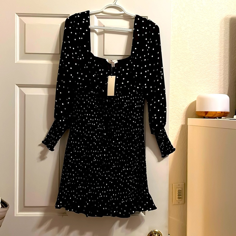 Black dress with white polka dots